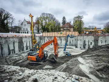 Excavation pit construction with geothermally activated elements by Bauer Resources