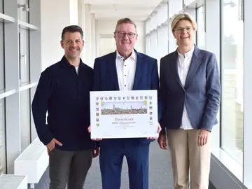 "Presentation of the Certificate of Honor to Bauer for the 235th Company Anniversary."